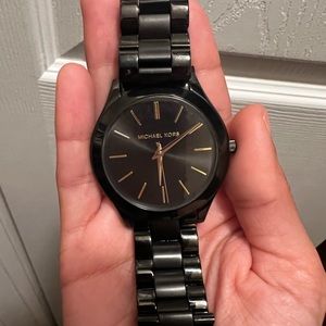 Black Michael Kors watch.